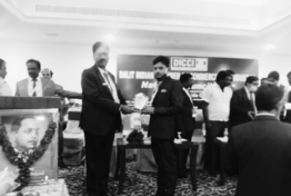 People connecting at a business event from the BankU archive